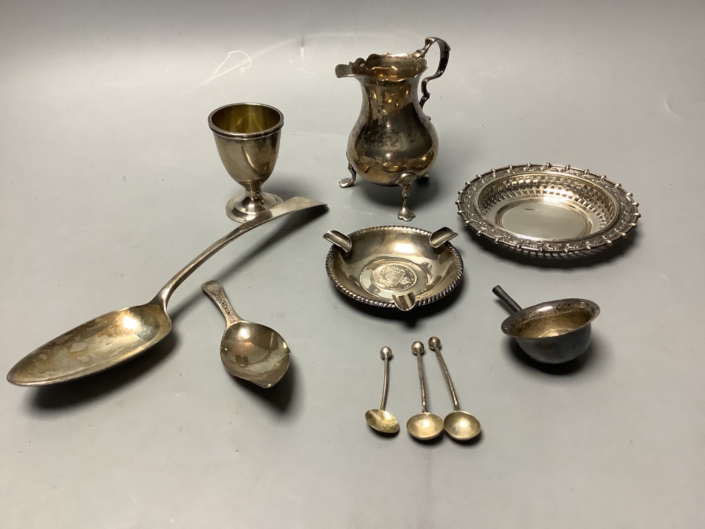 A small group of minor silver including 18th century silver tablespoon, Georgian silver cream jug, Georgian silver caddy spoon, egg cup, small dishes, etc. 9oz.